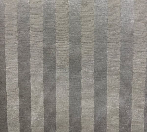 striped fabric with a silver and white color scheme, likely used for pillow drapery or upholstery.
