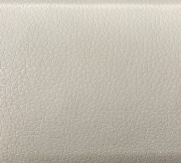 Close-up texture shot of a solid white upholstery pillow fabric.