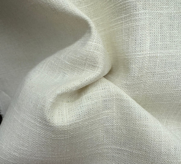 Close-up of white fabric with a textured pattern