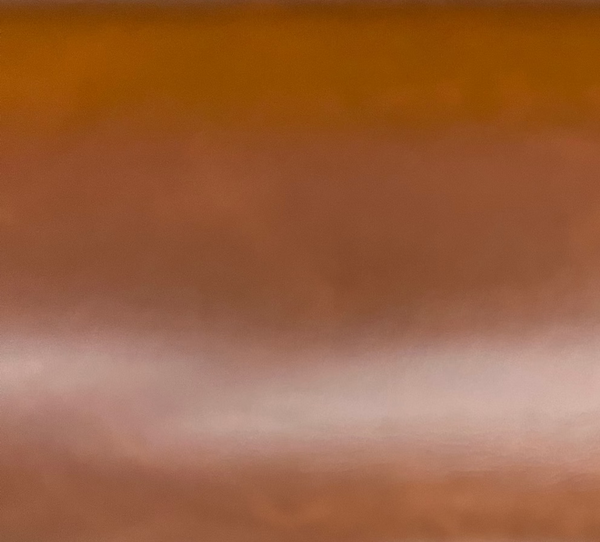 brown upholstery fabric with a smooth texture.