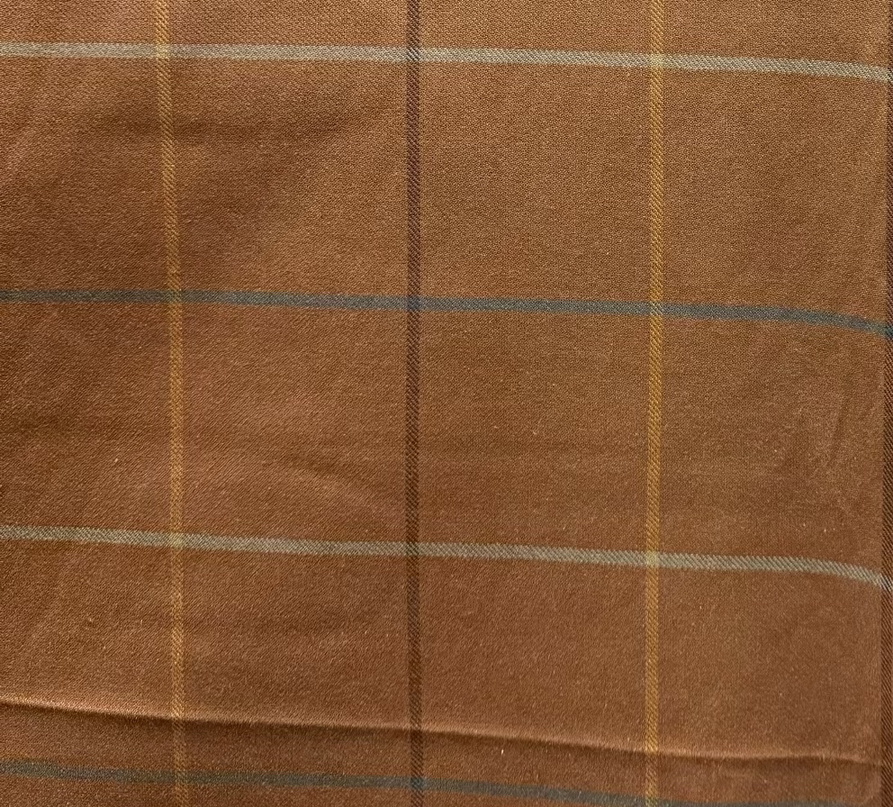 Brown fabric with a plaid pattern