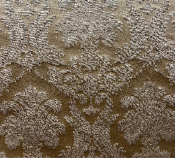 beige fabric with a floral damask pattern.