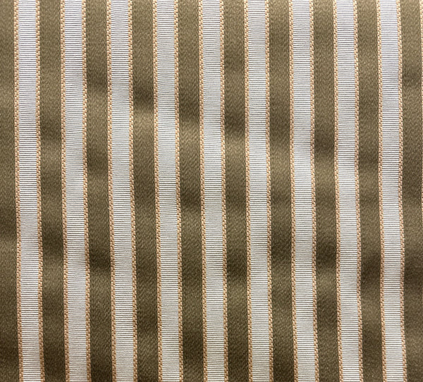 A close-up image of a striped fabric with brown and white colors.