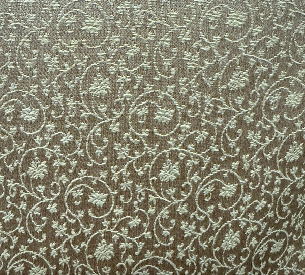 A close-up image of a fabric with a floral pattern in a beige color.