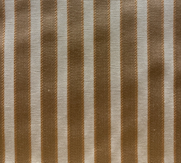 A close-up image of a striped fabric with a pattern of brown and white lines.