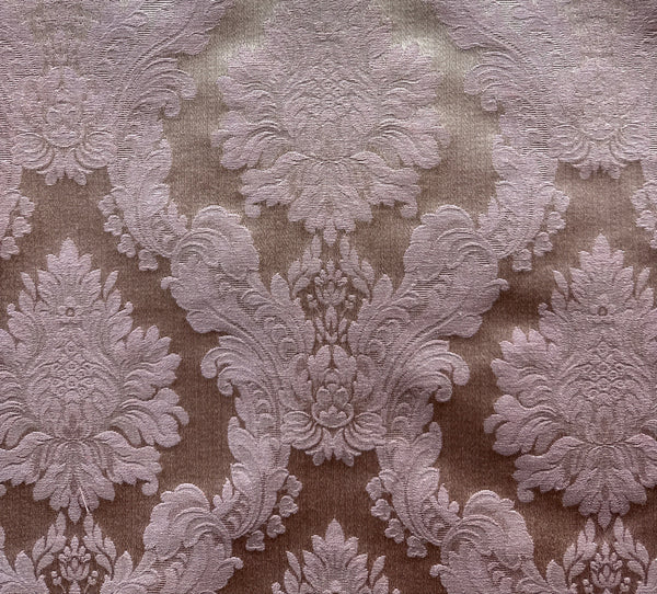 Decorative fabric with intricate purple and beige pattern