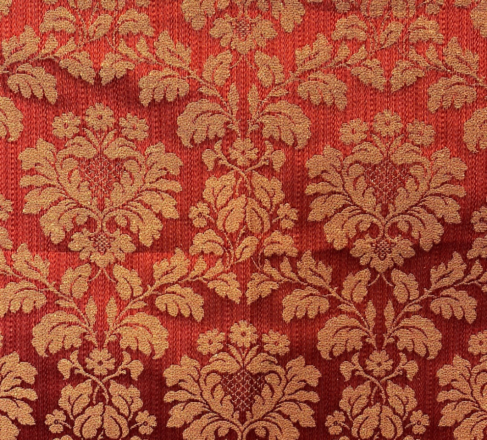 Close-up of a red fabric with a floral pattern